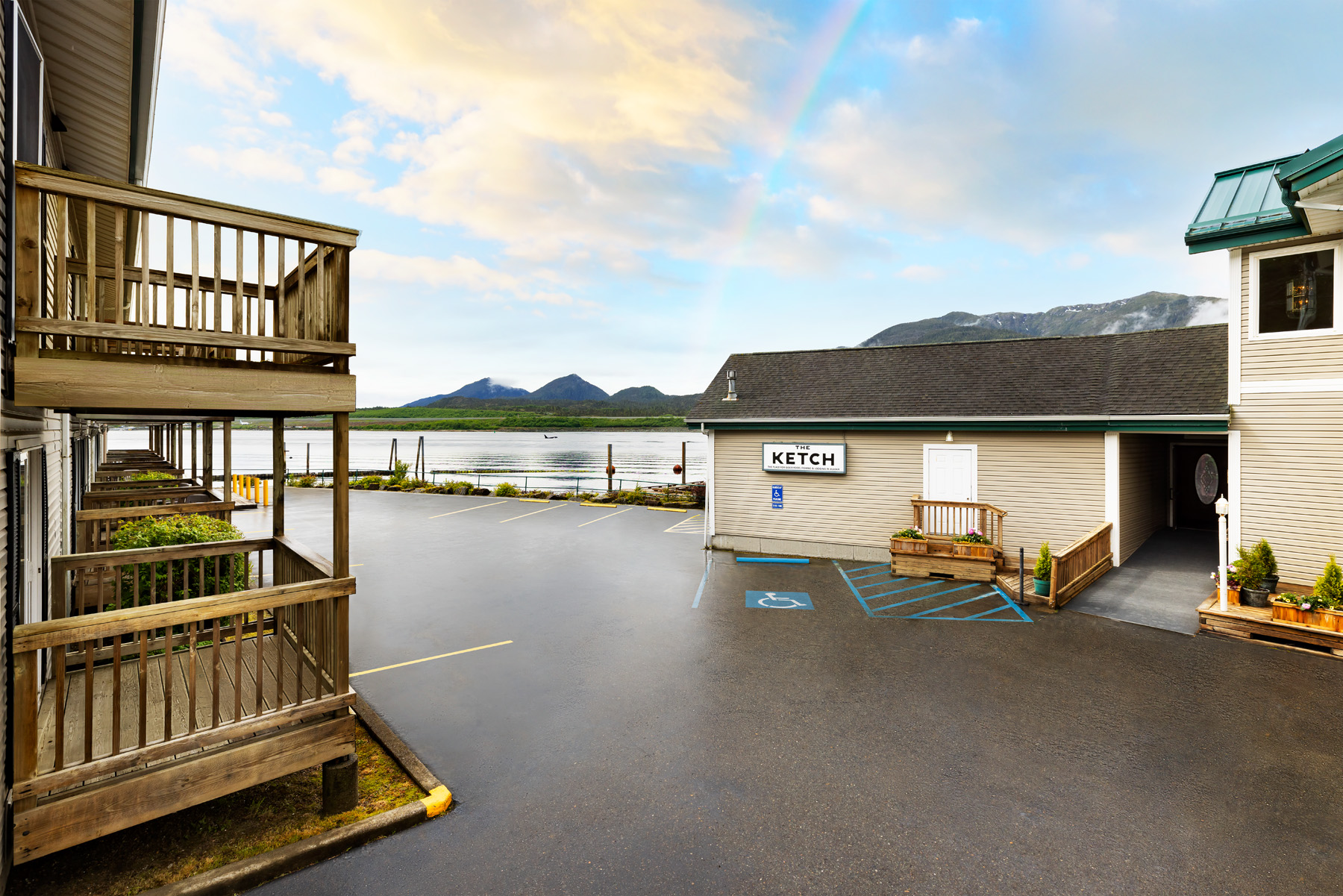 The Ketch Inn & Marina at sunset with rainbow over Tongass Narrows
